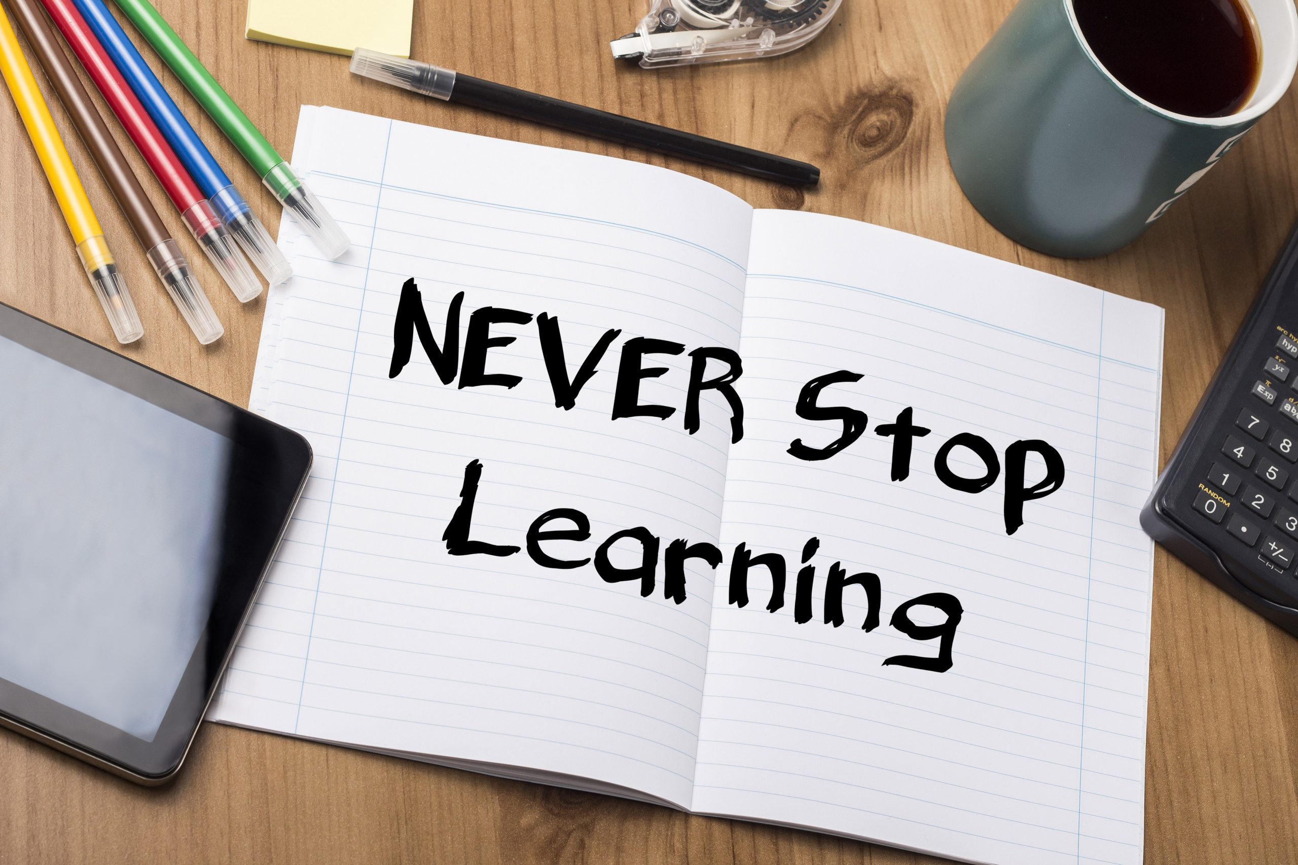 NEVER Stop Learning - Note Pad With Text On Wooden Table - with office  tools