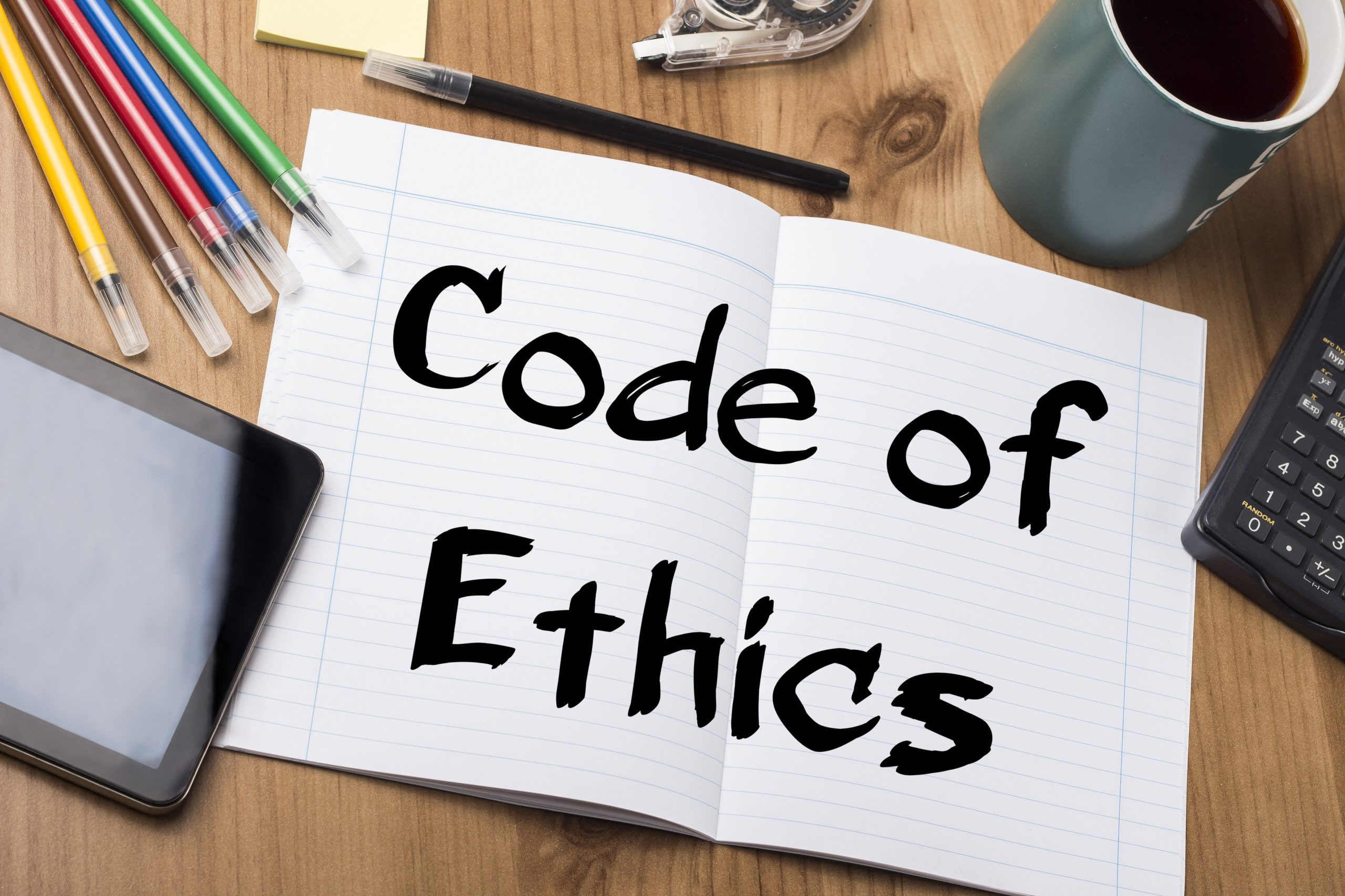 Code of Ethics - Note Pad With Text On Wooden Table - with office  tools
